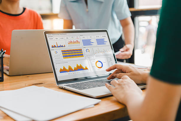 Agile software development project manager coordinating technical launch schedules, resource allocation charts, and development goals on an enterprise platform.